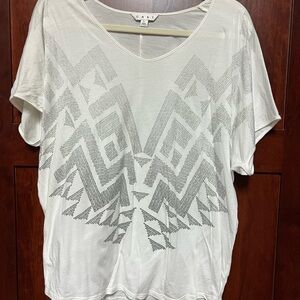 CAbi #560 White Jan Tee - size L. EUC